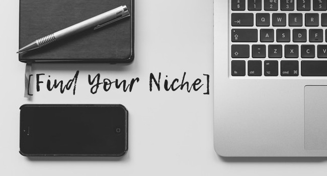 Black and white desk top with Find Your Niche written on it